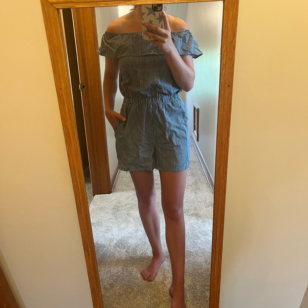 A denim blue romper with white stripes